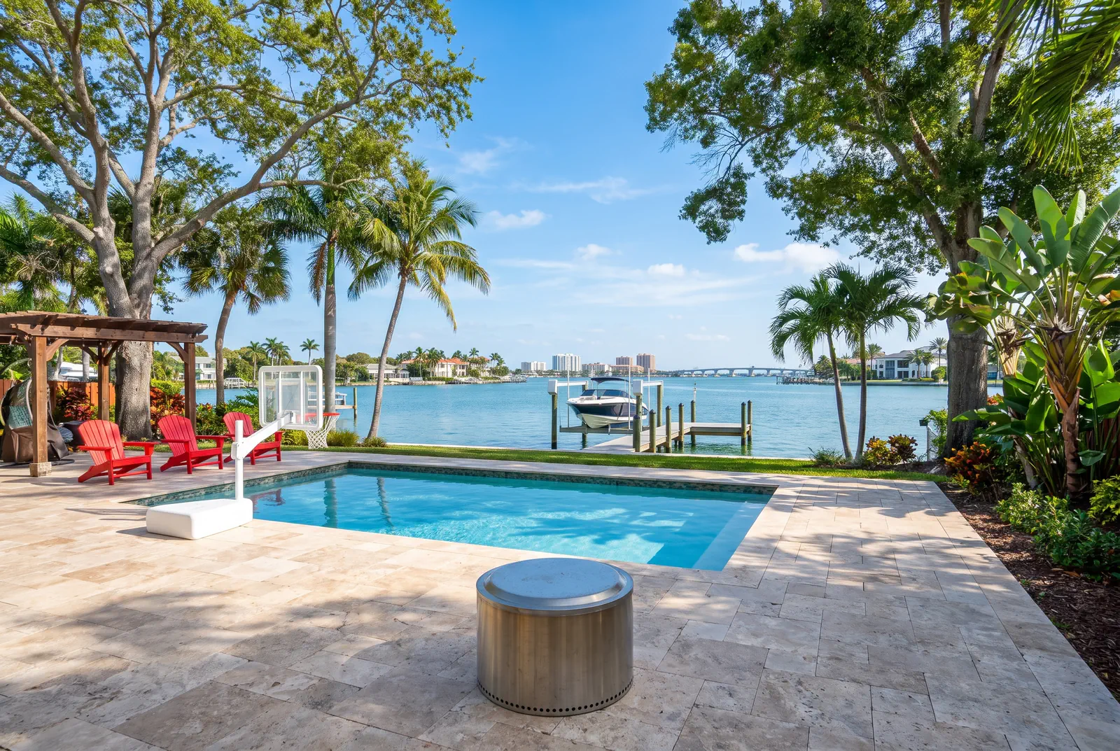 Travertine in Clearwater: a travertine pool deck on the Intracoastal with the waterway behind it